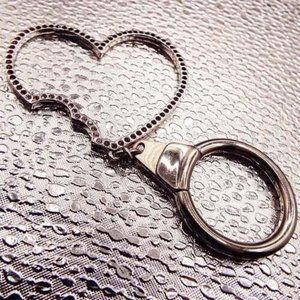 SWAROVSKI CLEAR TO RED CRYSTALS "BITE OUT OF MY HEART" SILVERY EUC KEYCHAIN 26